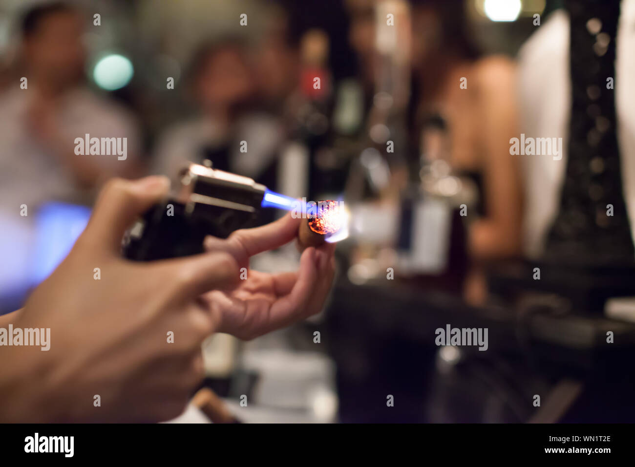 Burning cigar hi-res stock photography and images - Alamy