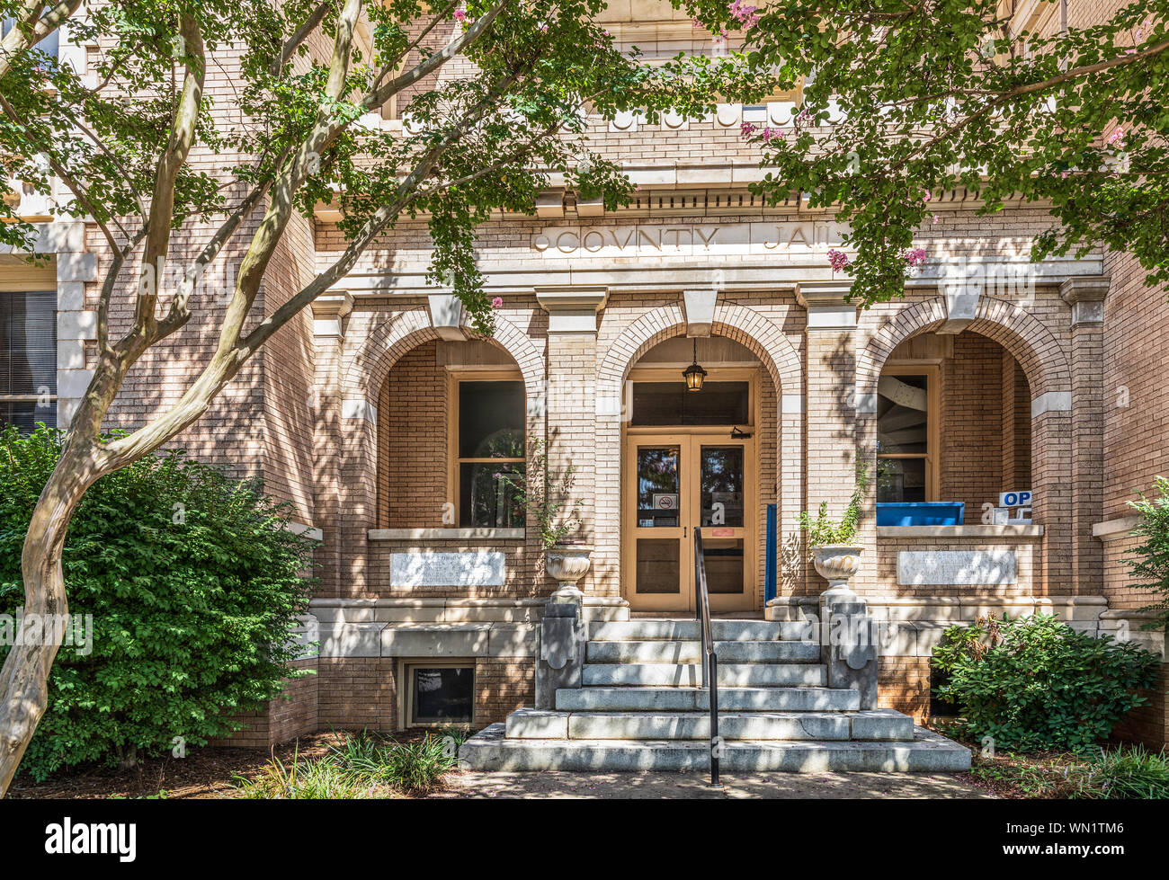 STATESVILLE, NC, USA-1 SEPTEMBER 2019: An historic building marked as the County Jail, now housing the county commissioners' offices. Stock Photo