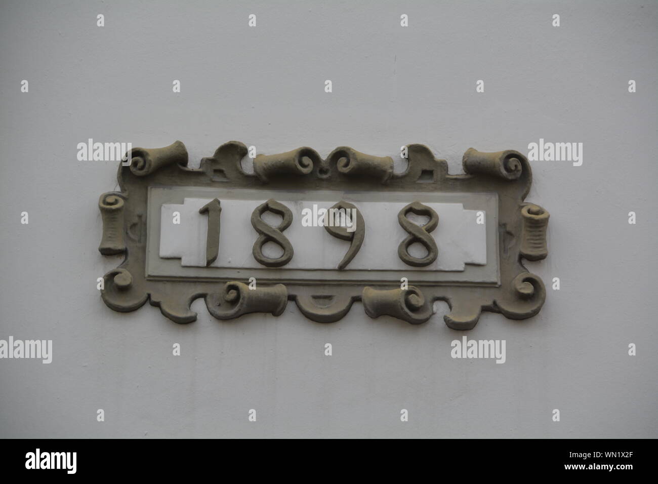 Close-up Of Number Plate On Door Stock Photo