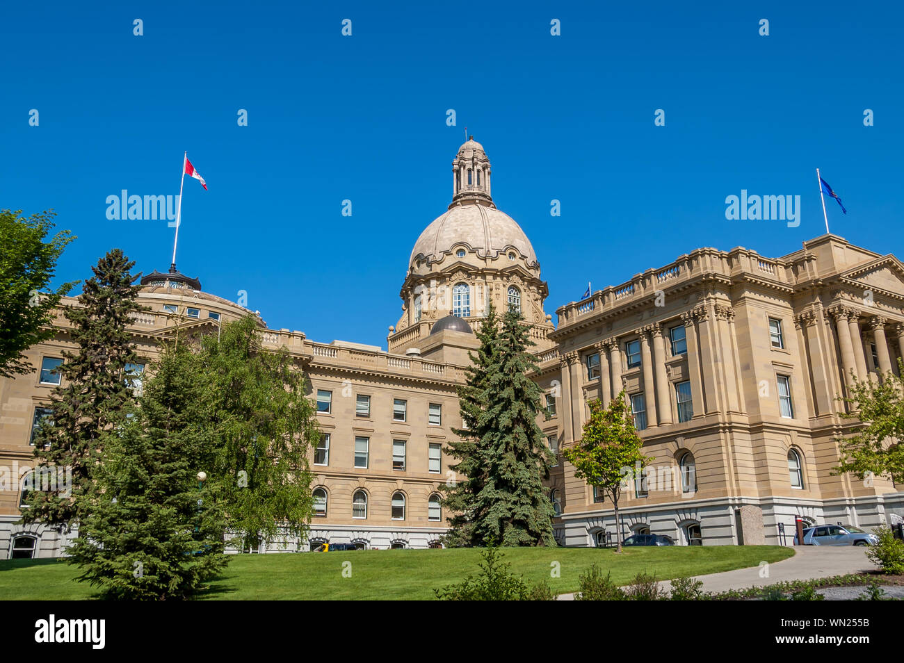 Exterior facade of The Alberta Legislature Building in Edmonton. Photo taken on a warm summer day. Legislative grounds visible. Stock Photo
