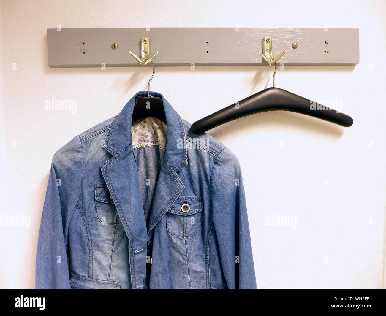 Jacket Hanging On Wall High Resolution Stock Photography and Images - Alamy