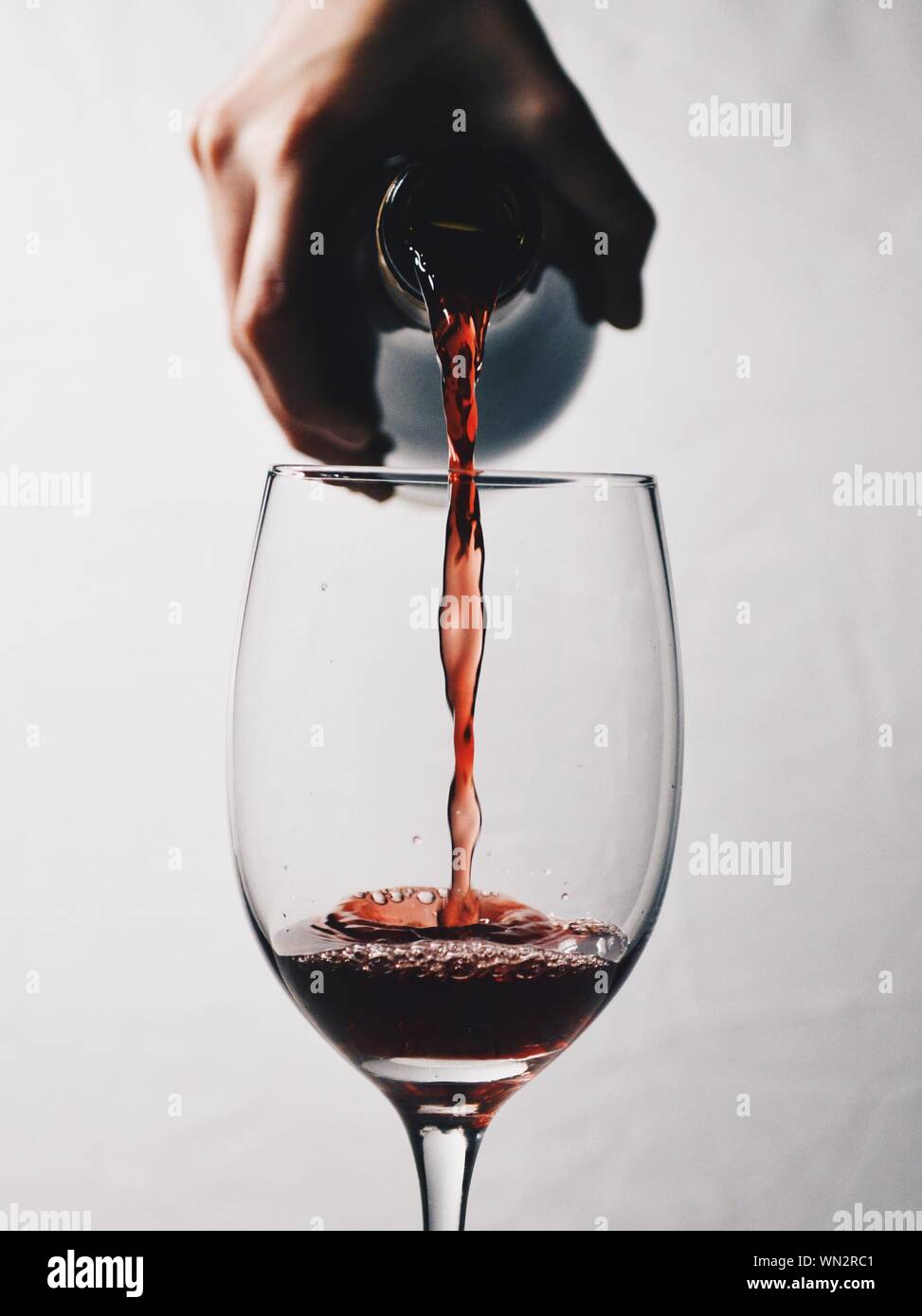 White wine pouring hand hires stock photography and images Alamy