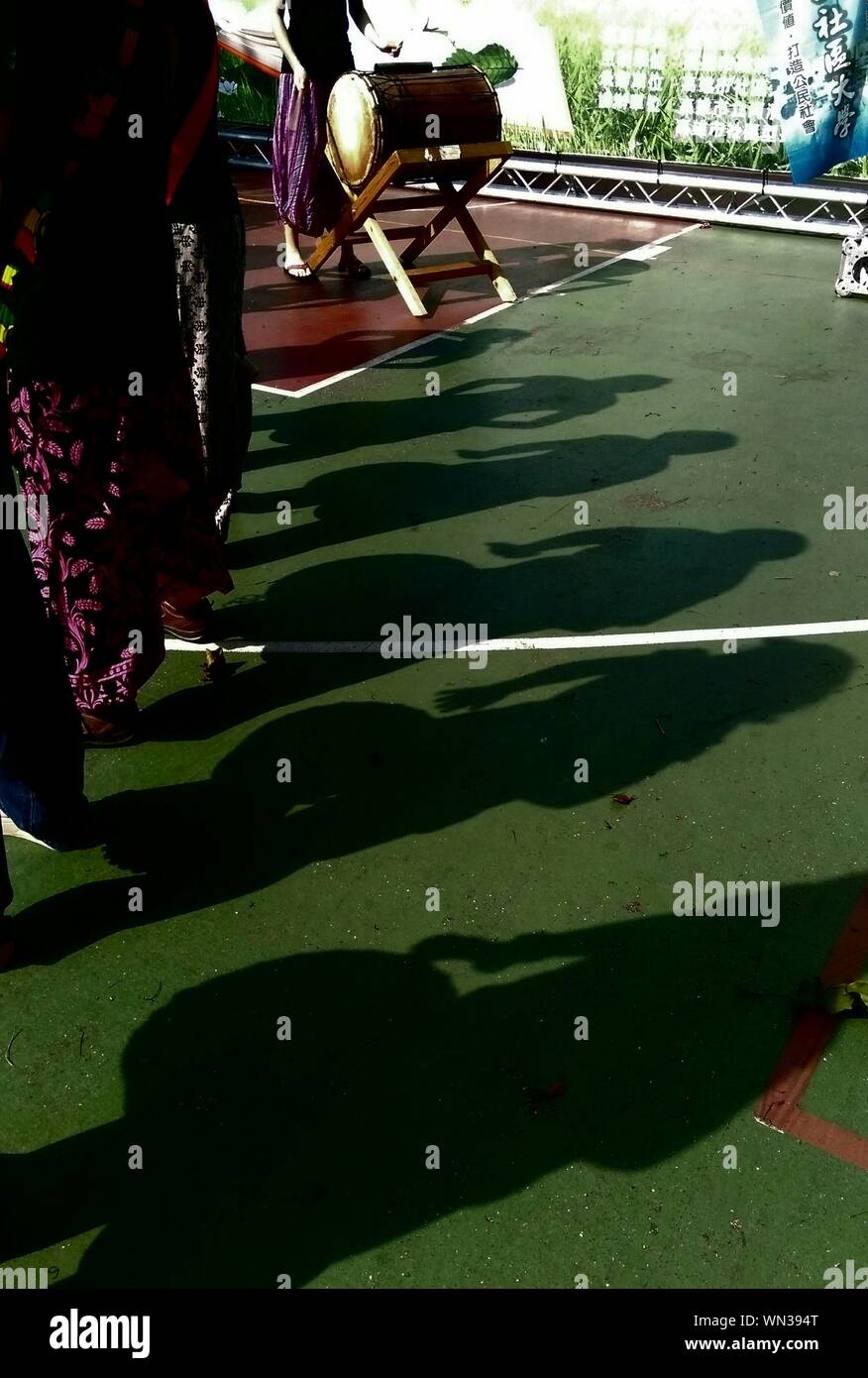 View Of Human Shadows And People Playing On Drums Stock Photo Alamy