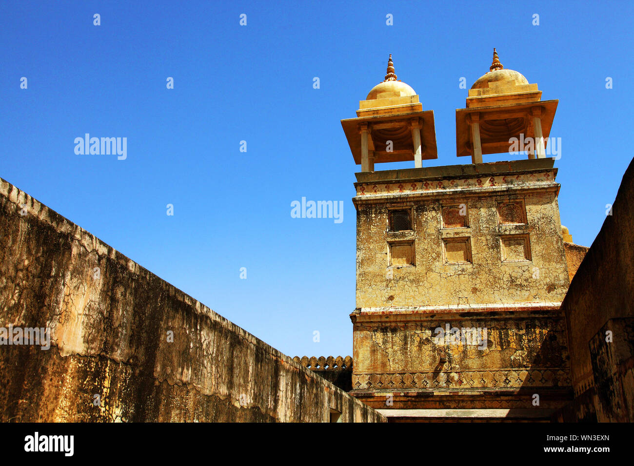 Low Angle View Of Architectural Column At Nahargarh Fort Against Clear Blue Sky Stock Photo