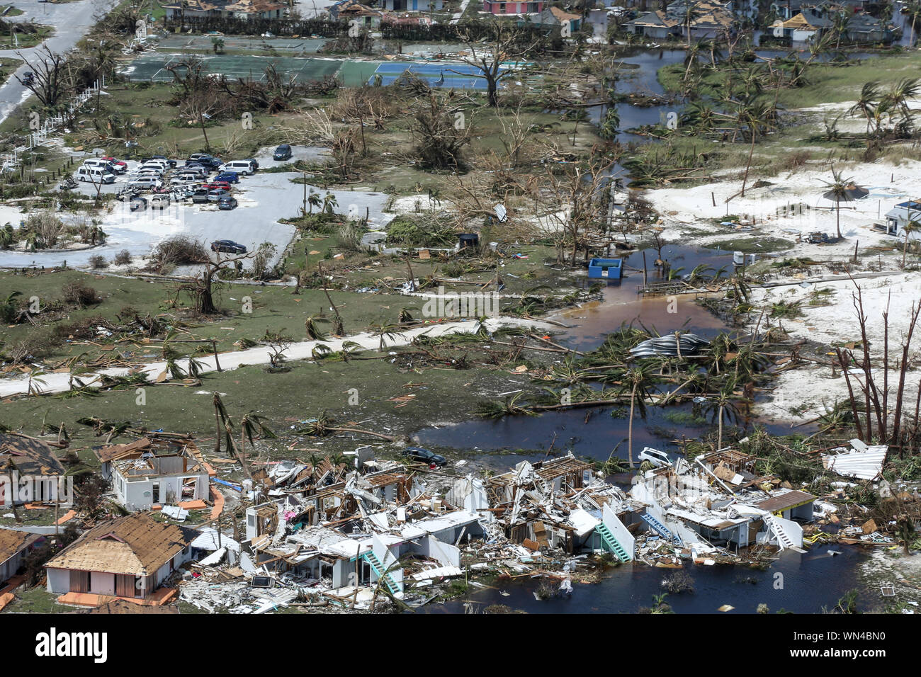 Aerial view of destruction from category 5 Hurricane Dorian in the Bahamas. (Photo by Erik Villa Rodriguez / USCG) Stock Photo