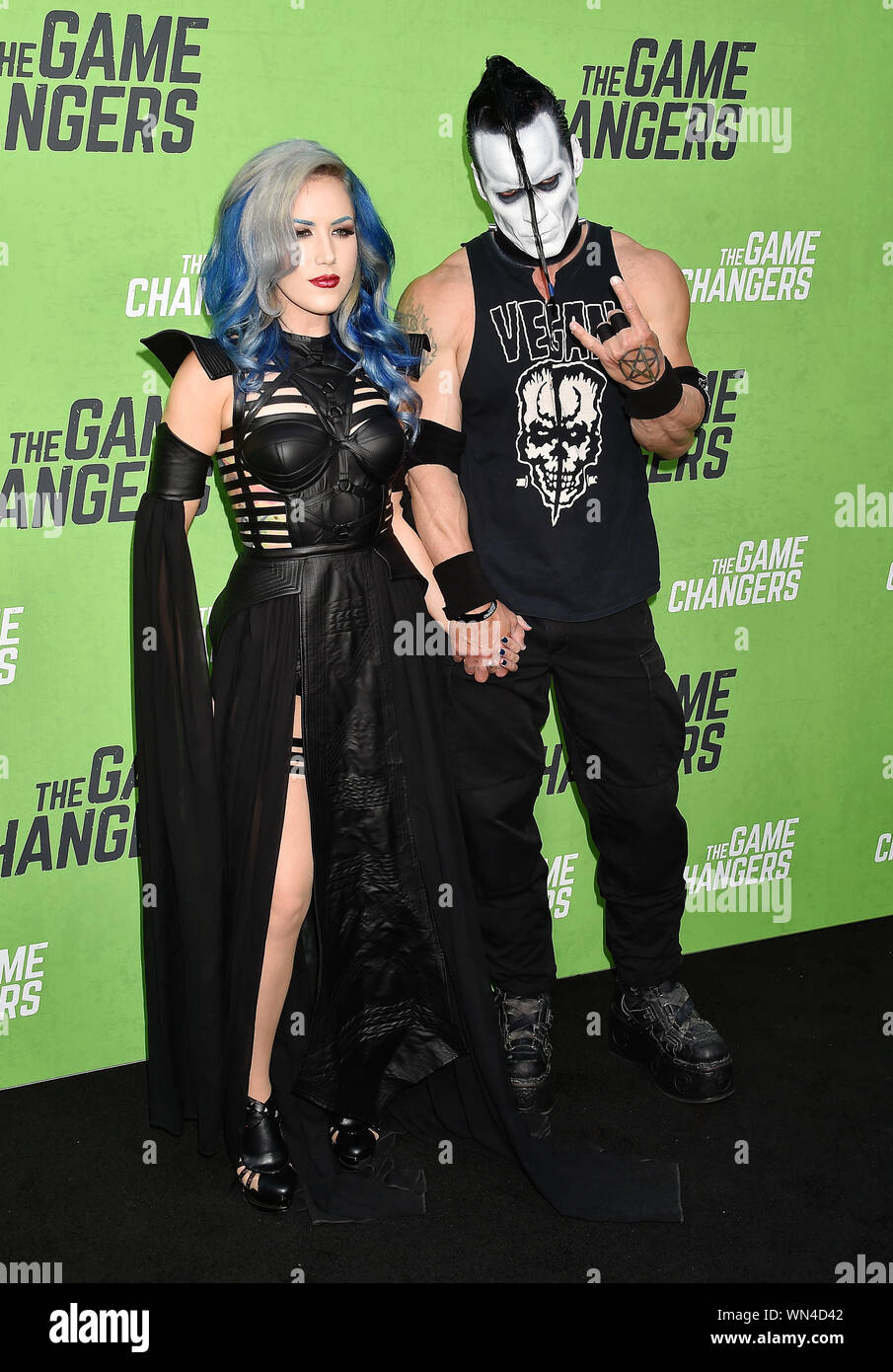 HOLLYWOOD, CA - SEPTEMBER 04: Alissa White-Gluz (L) and Doyle Wolfgang von Frankenstein attend the LA Premiere Of "The Game Changers" at ArcLight Hollywood on September 04, 2019 in Hollywood, California. Stock Photo