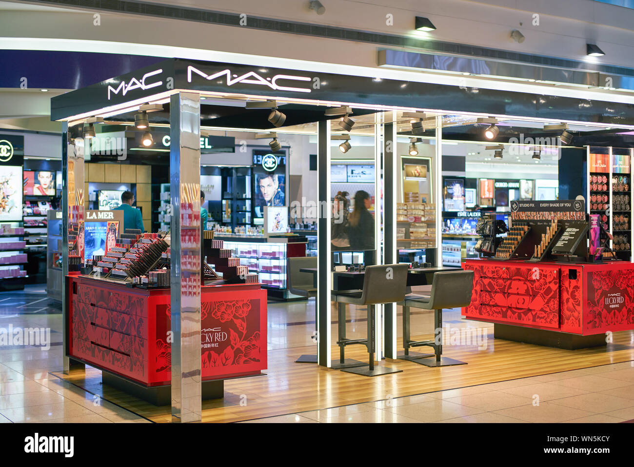DUBAI, UAE - CIRCA FEBRUARY, 2019: MAC makeup products on display at International Airport Stock Photo -