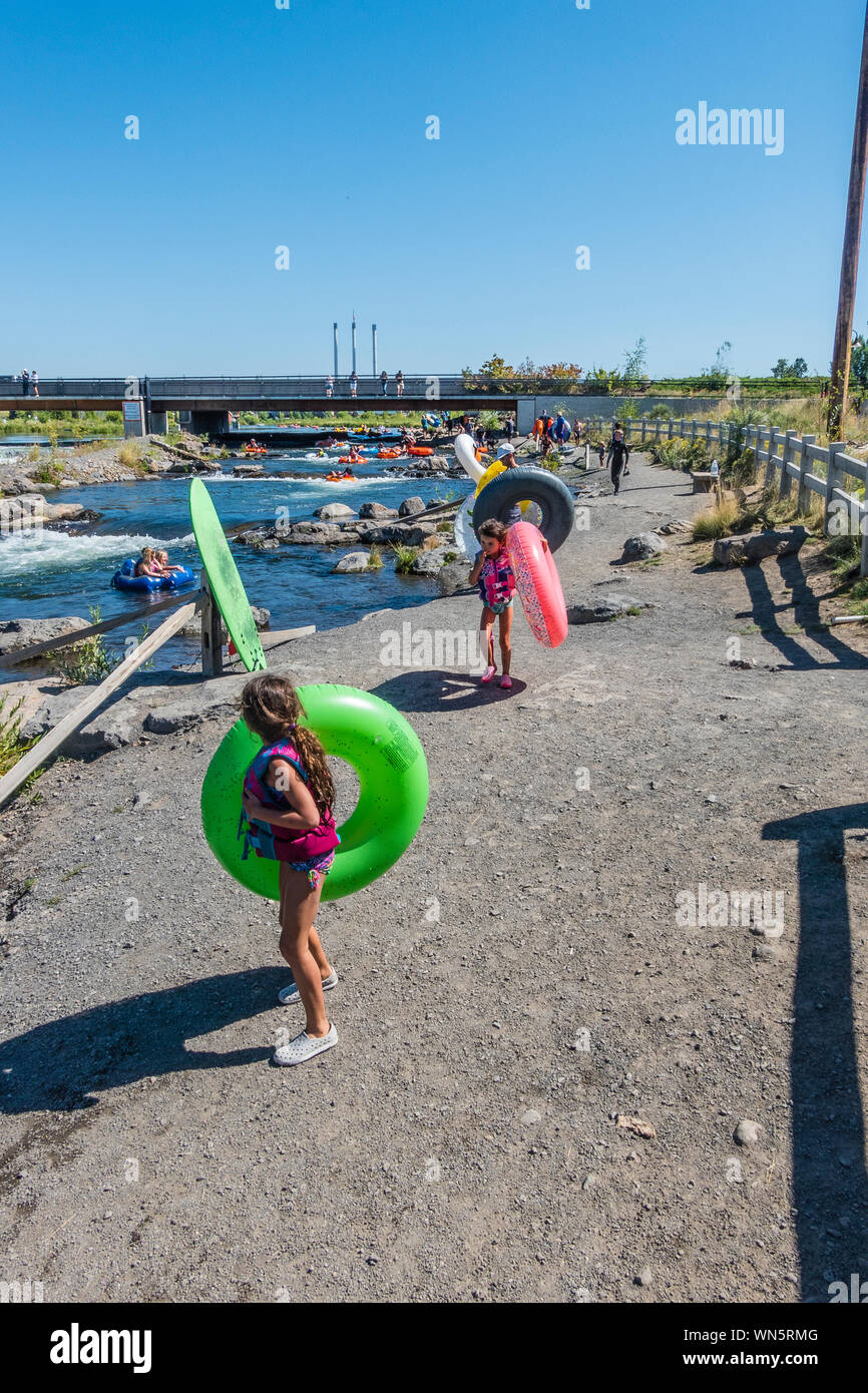 Tubing in the Deschutes River in Bend, Oregon. Stock Photo