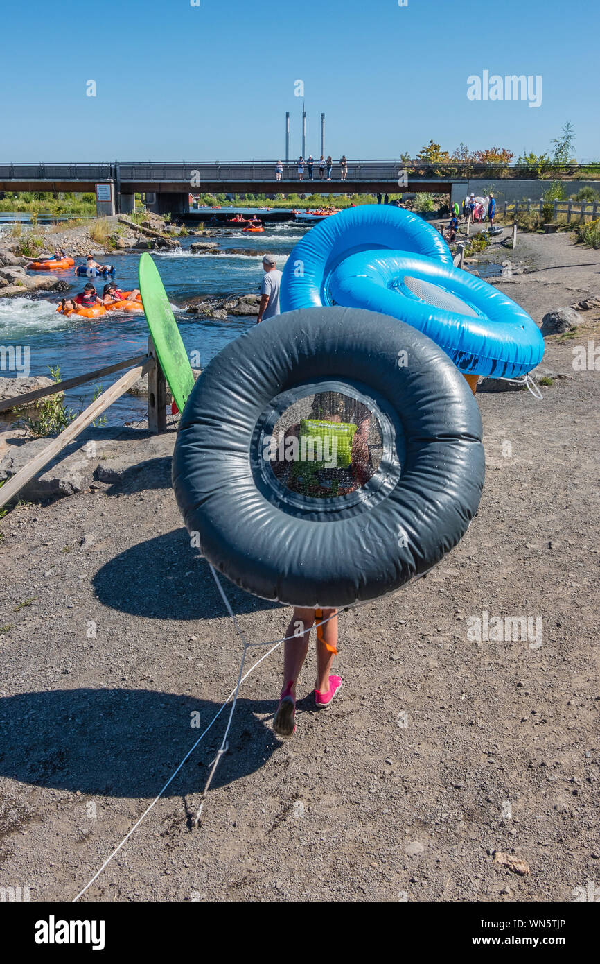 Tubing in the Deschutes River in Bend, Oregon. Stock Photo