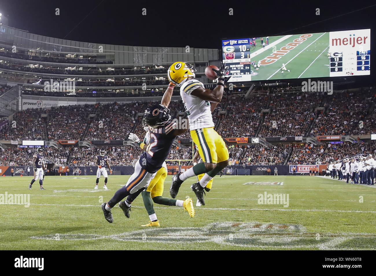 Chicago, United States. 05th Sep, 2019. Green Bay Packers strong safety Adrian Amos (R) intercepts a pass intended for Chicago Bears wide receiver Allen Robinson (L) during the second half of an NFL game at Soldier Field in Chicago on Thursday, September 5, 2019. Photo by Kamil Krzaczynski/UPI Credit: UPI/Alamy Live News Stock Photo