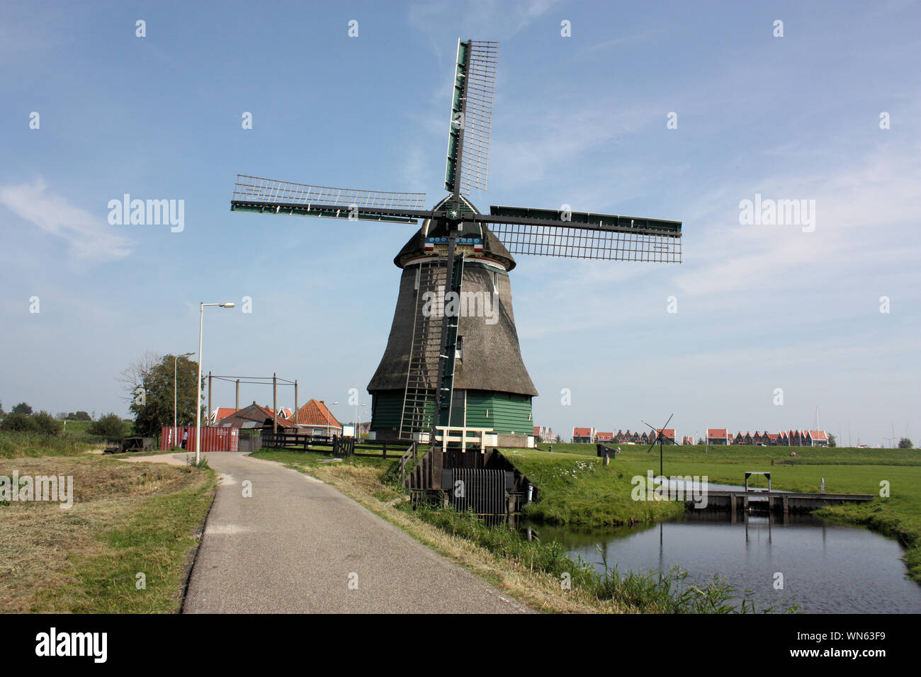 A windmill in Volendam. Nowadays, windmills around the Netherlands are only open several days every year.They are no longer open regularly to visitors Stock Photo