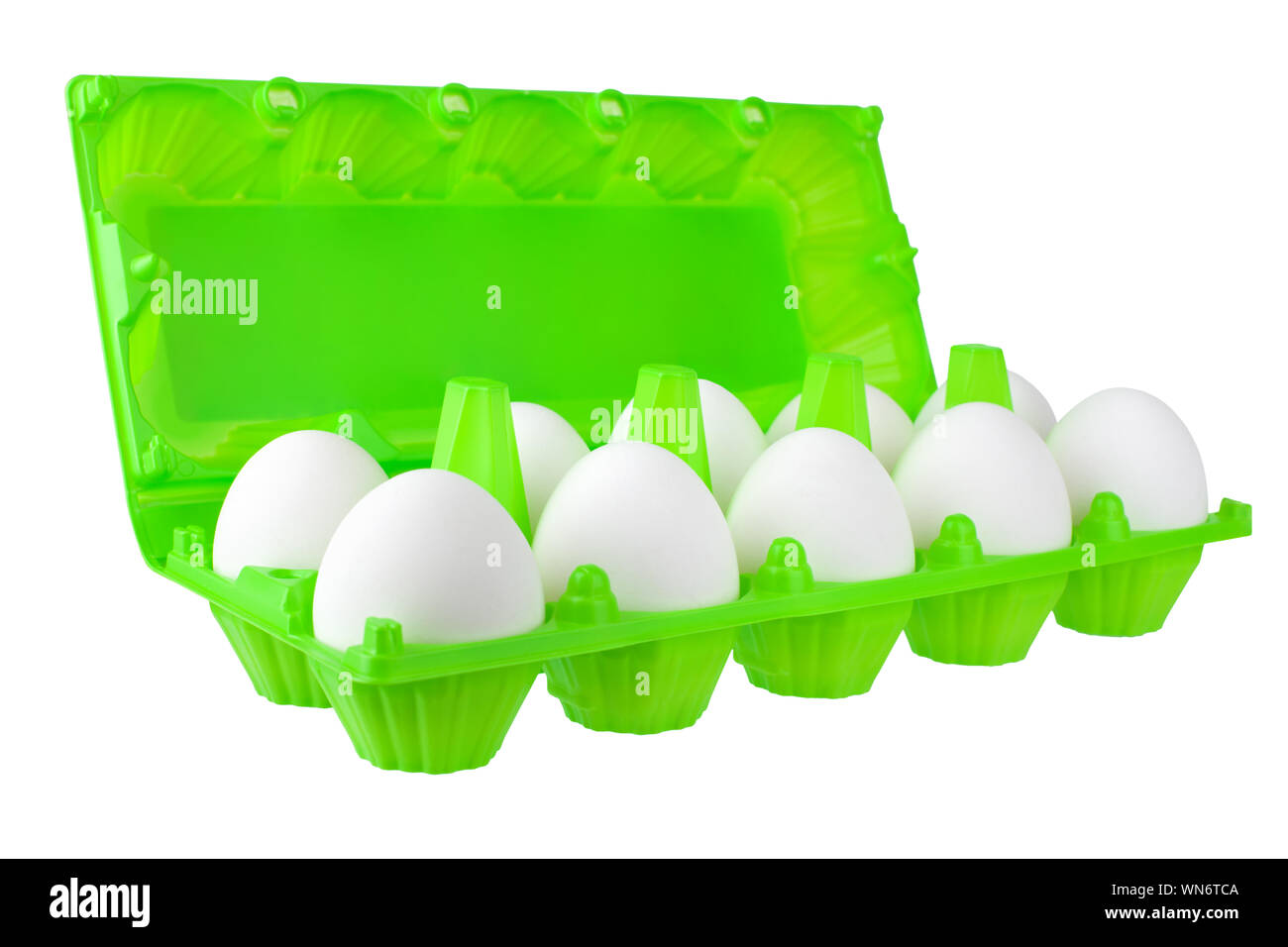 Dozen white eggs in open green plastic package on white background isolated close up side view, eco friendly color design, healthy food concept Stock Photo