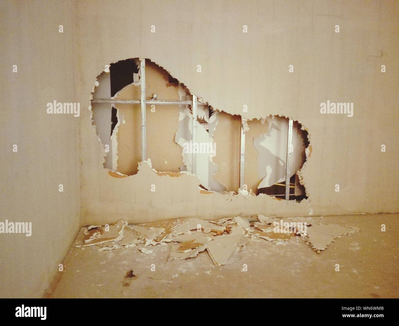 Damaged Broken Wall In Room Stock Photo Alamy