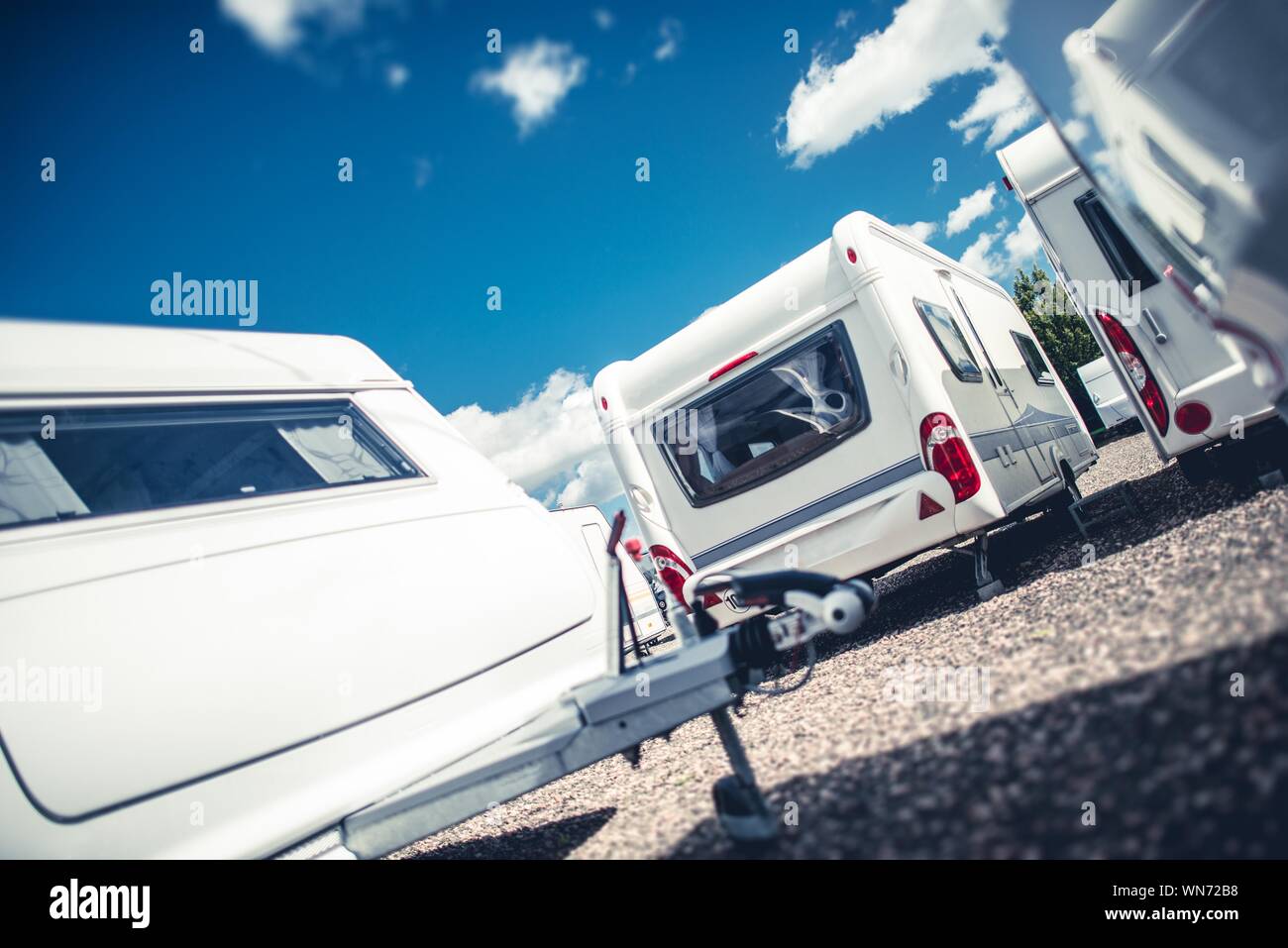 Camper Trailers Against Sky Stock Photo