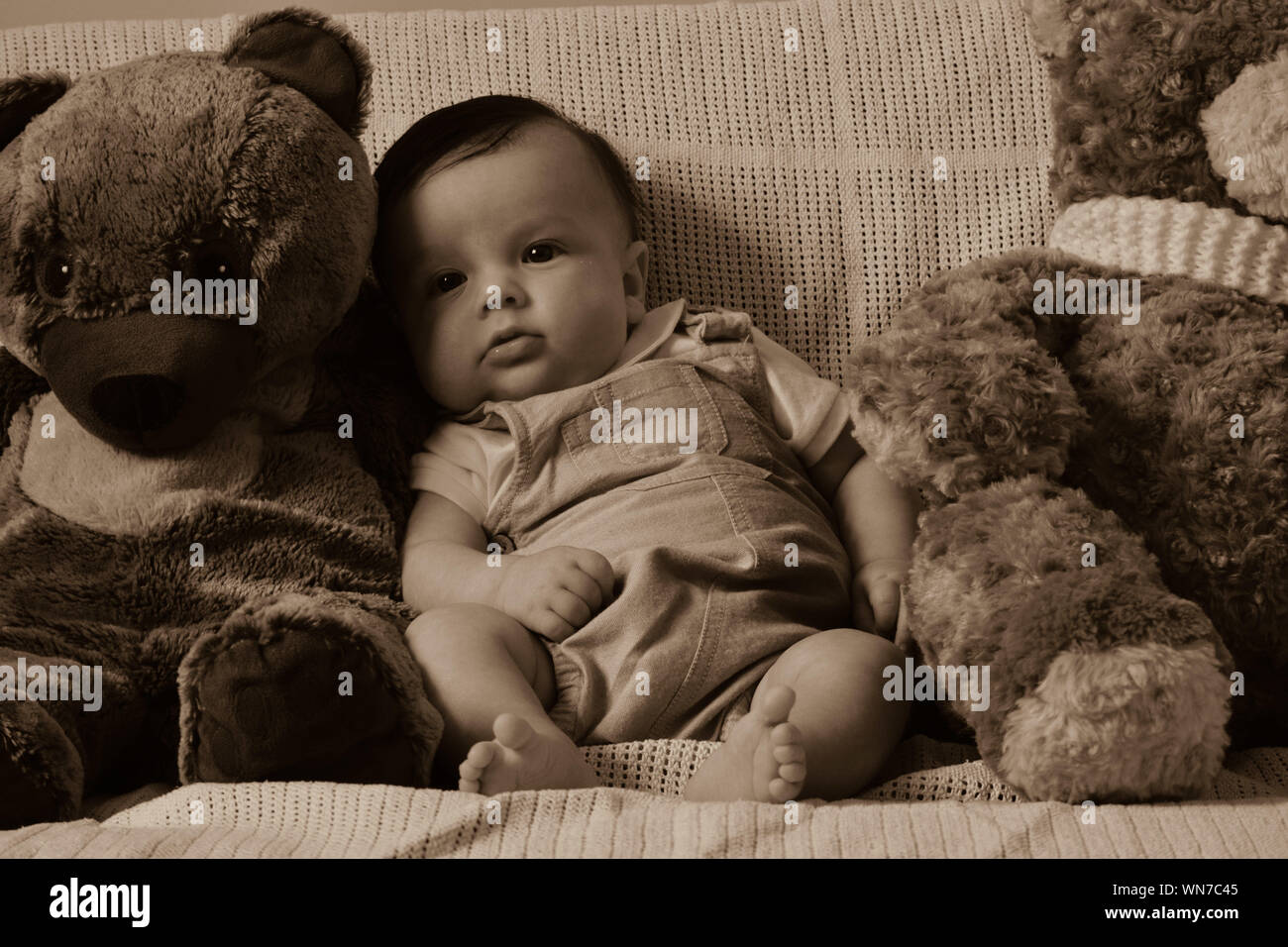 Baby boy with teddy bear hi-res stock photography and images - Alamy