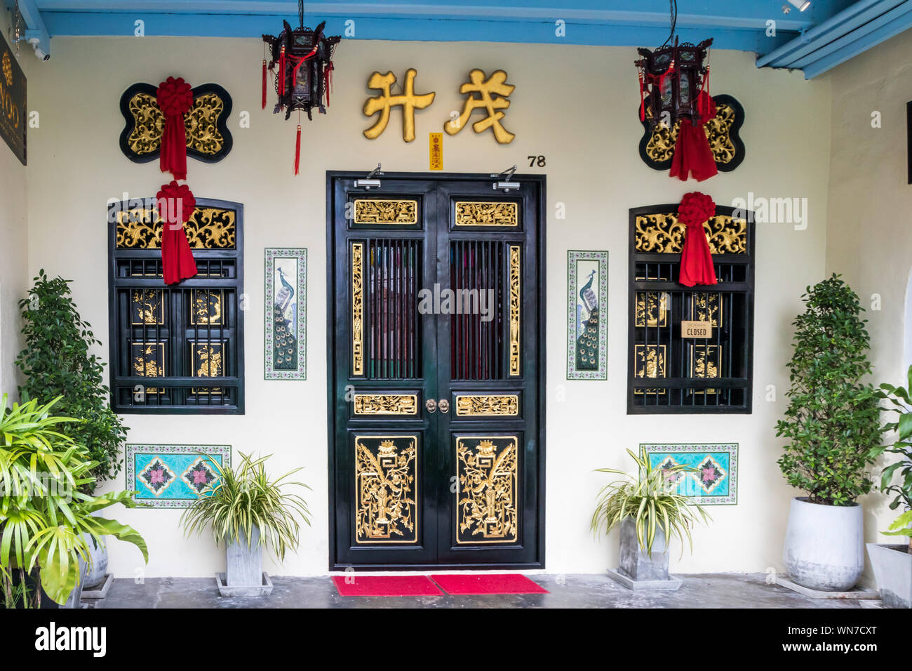 Phuket, Thailand - June 17th 2019: Renovated Sino Portuguese architecture on Thalang Road. Old Phuket town has many such buildings. Stock Photo
