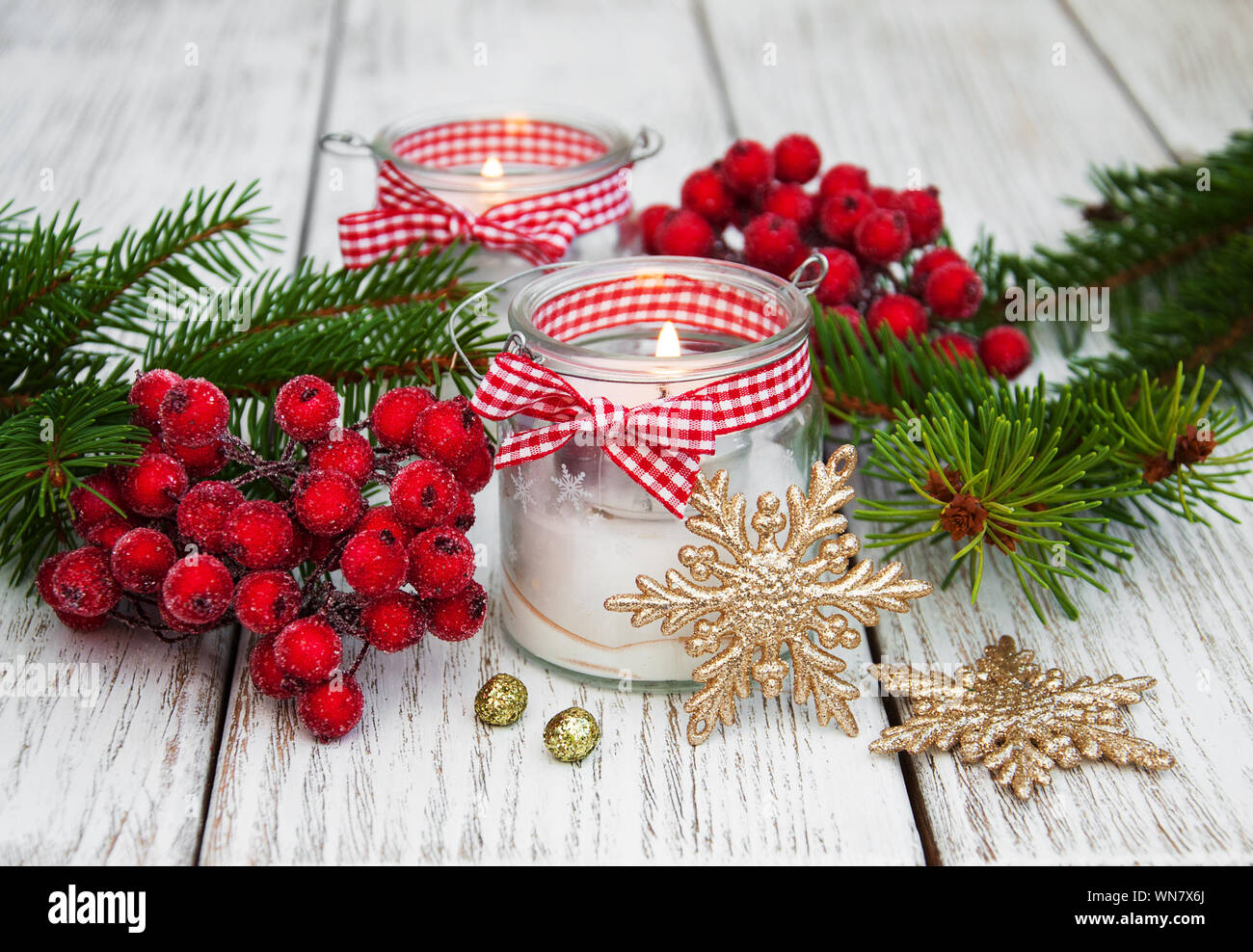 Christmas Decorations Candles In Glass Jars With Fir On A Old