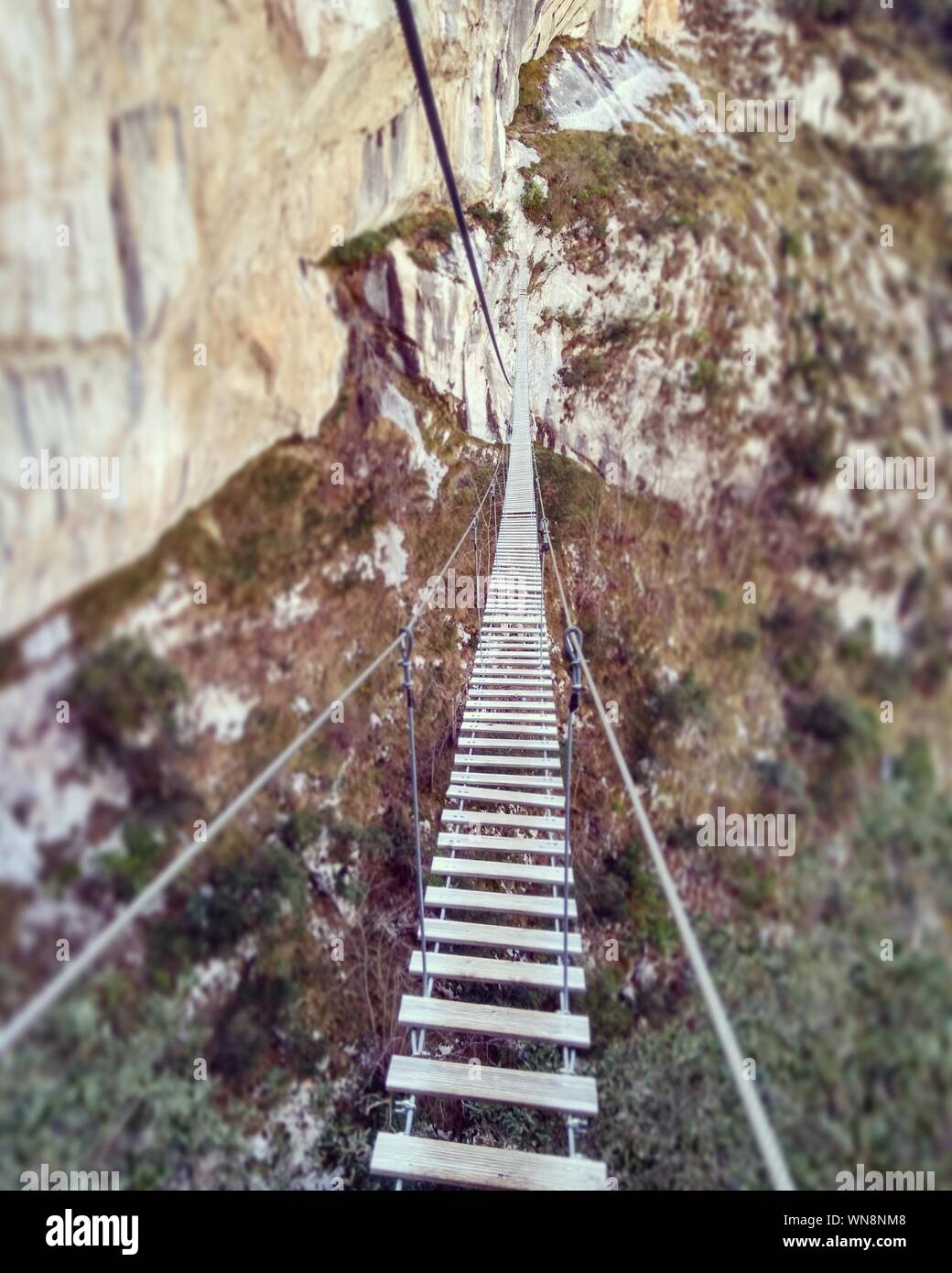 Rope bridge mountains hires stock photography and images Alamy