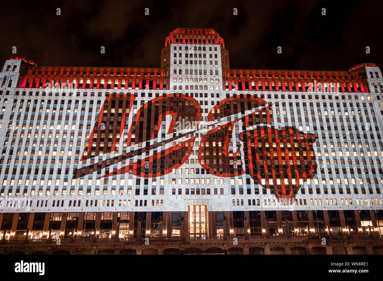 Chicago, USA-September 5, 2019: The Merchandise Mart is celebrating the 100th playing season of the Chicago Bears NFL with projected wall art at night Stock Photo