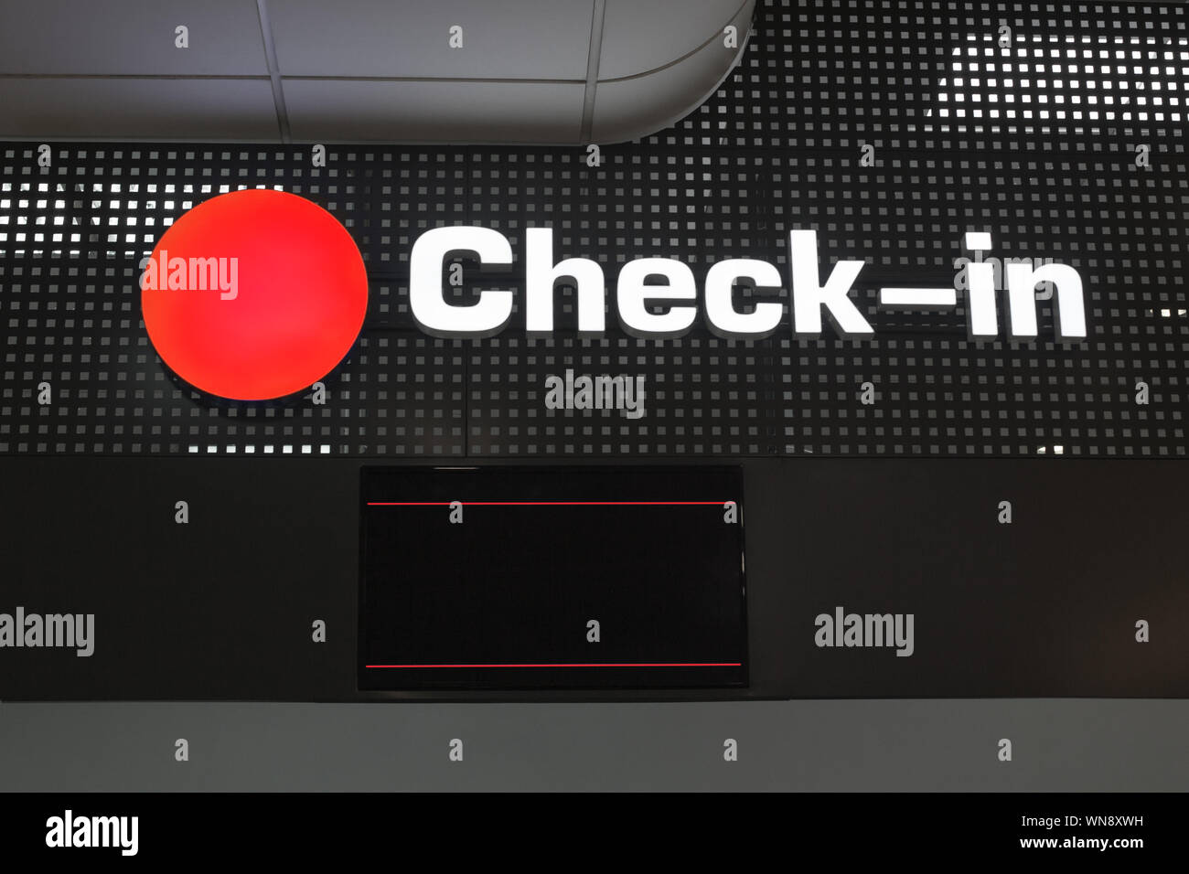 Check in desk at international airport, checkin counter and monitor for