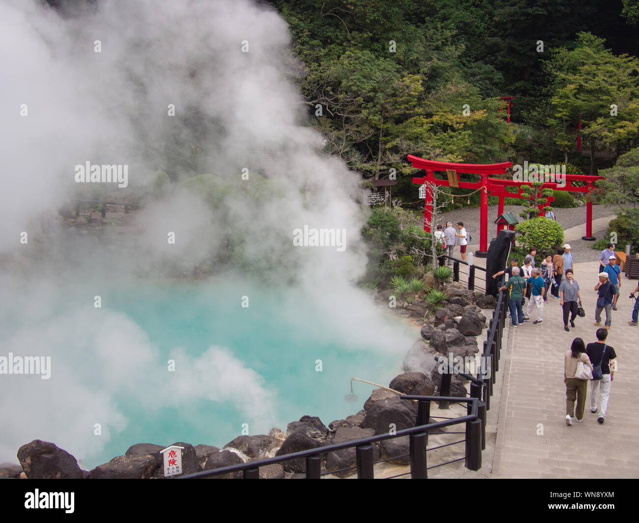 A hot spring known as Umi Jigoku or Sea Hell in Beppu, Oita. This hot spring was formed when Mount Tsurumi erupted more than 1200 years ago. Stock Photo