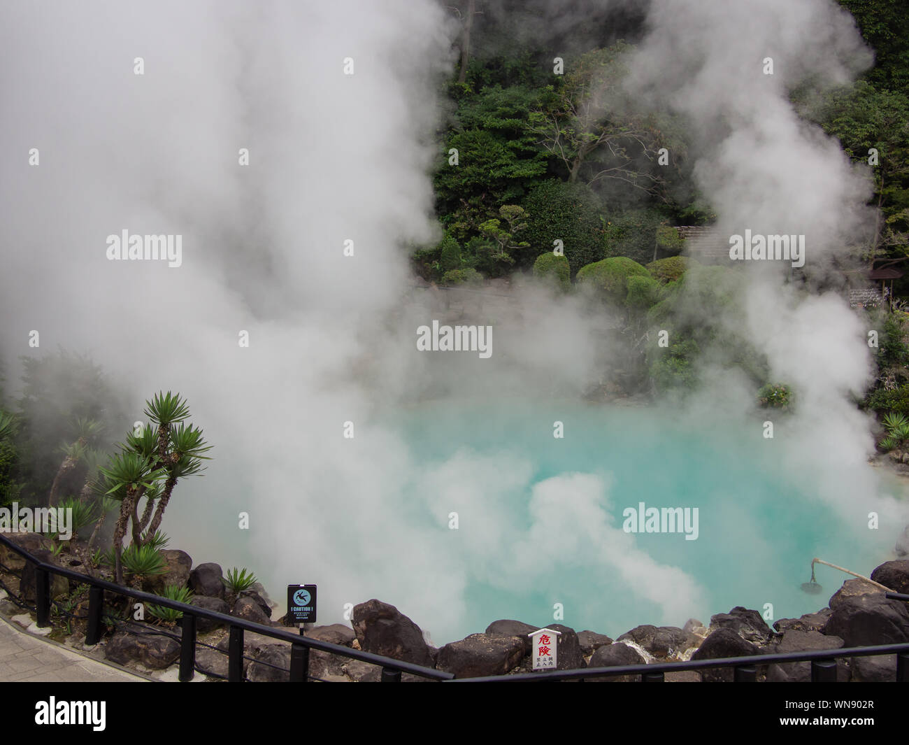 A hot spring known as Umi Jigoku or Sea Hell in Beppu, Oita. This hot spring was formed when Mount Tsurumi erupted more than 1200 years ago. Stock Photo