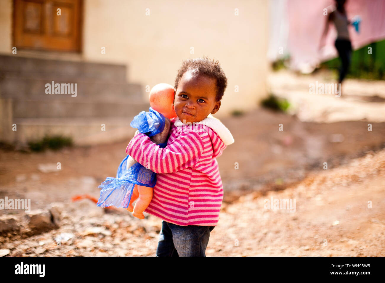 boy with doll