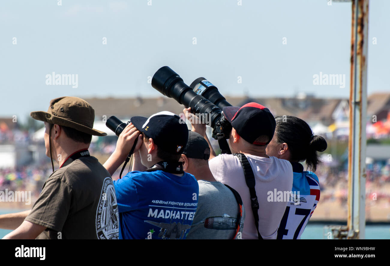 Clacton   United Kingdom 23 August  2019  -:  Photographers pointing zoom lenses to sky at Clacton free airshow Stock Photo