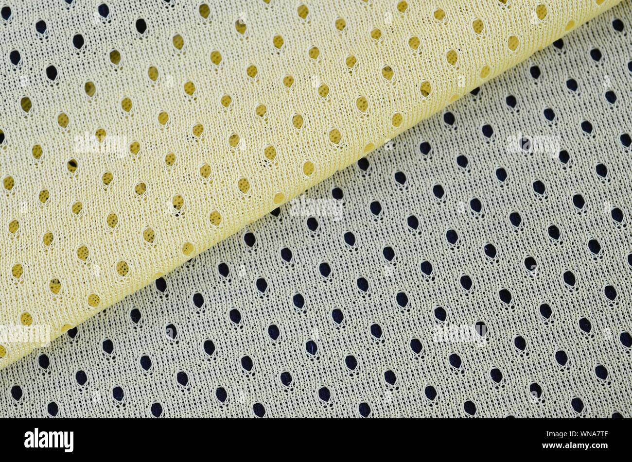 Yellow mesh sport wear fabric textile pattern background. Yellow color ...