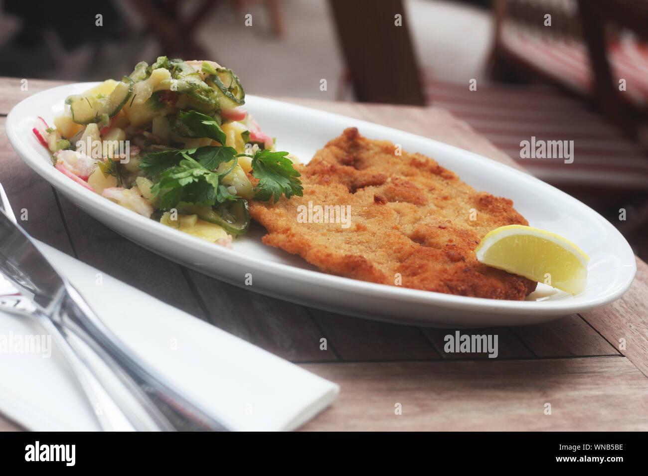 Wiener Schnitzel On A Restaurant Table Stock Photo - Alamy