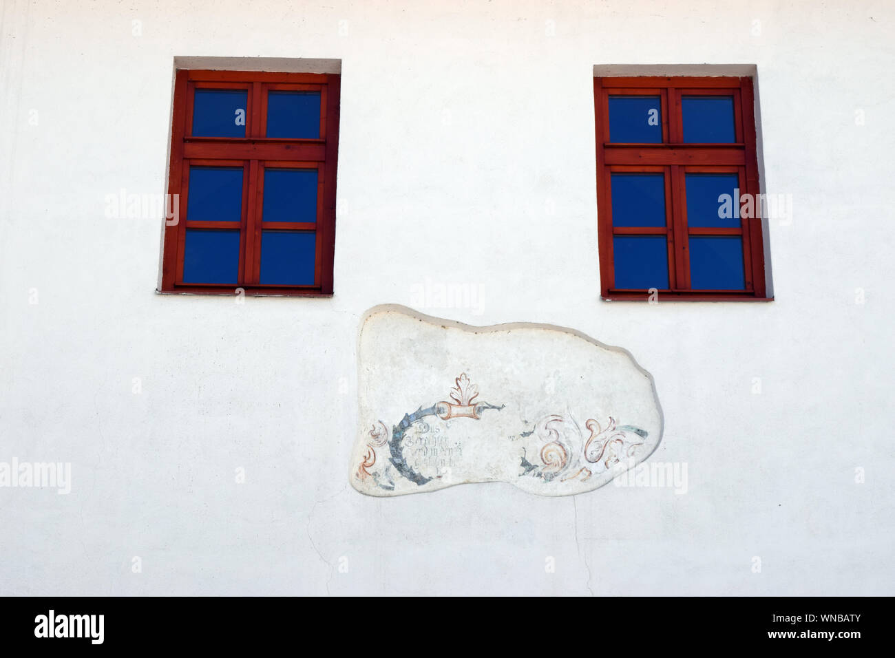 Detail of a mural on a restored house facade in Slovakia. Stock Photo
