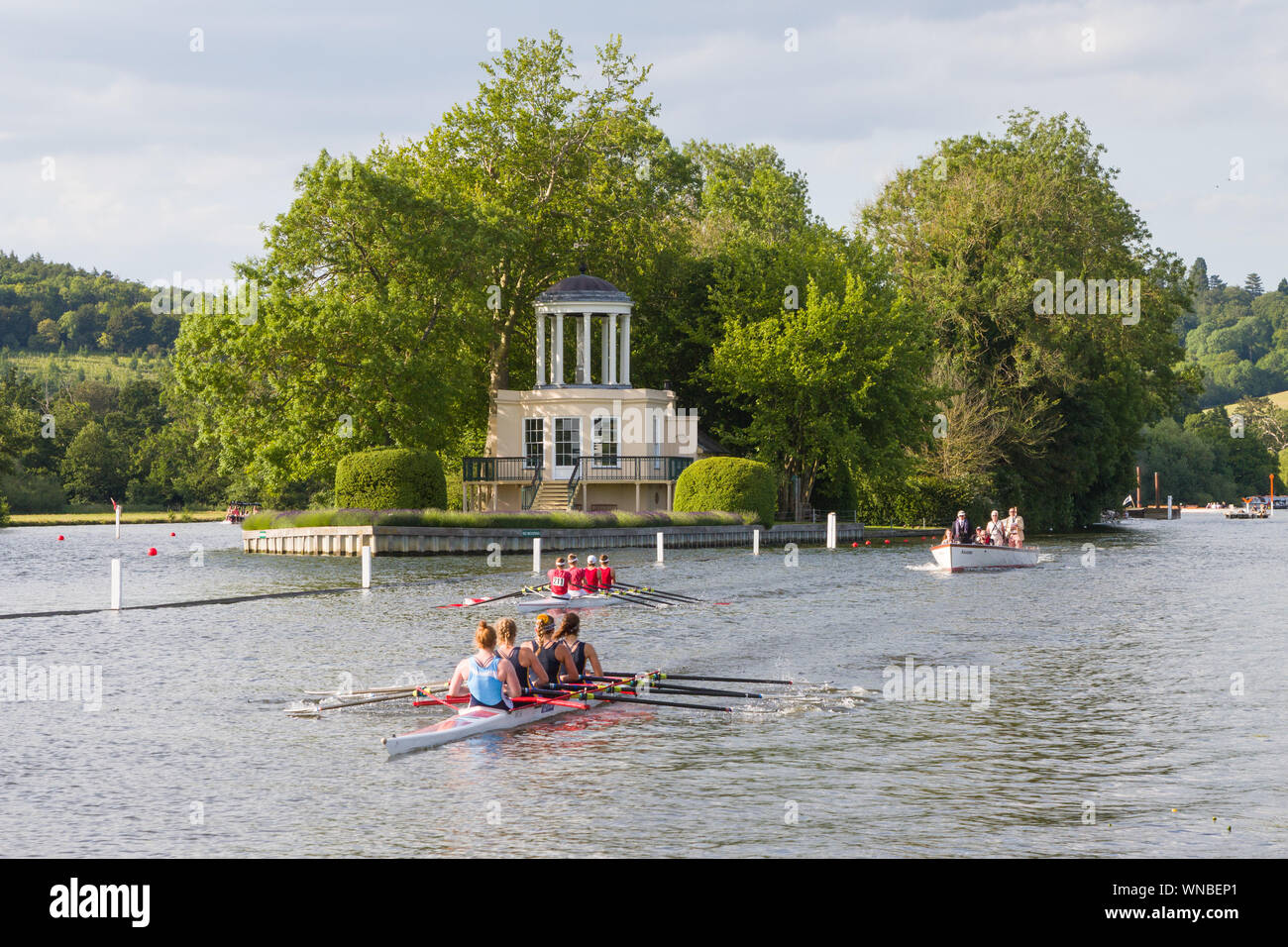 The start of a race at Henley Womens Regatta with Temple Island behind Stock Photo