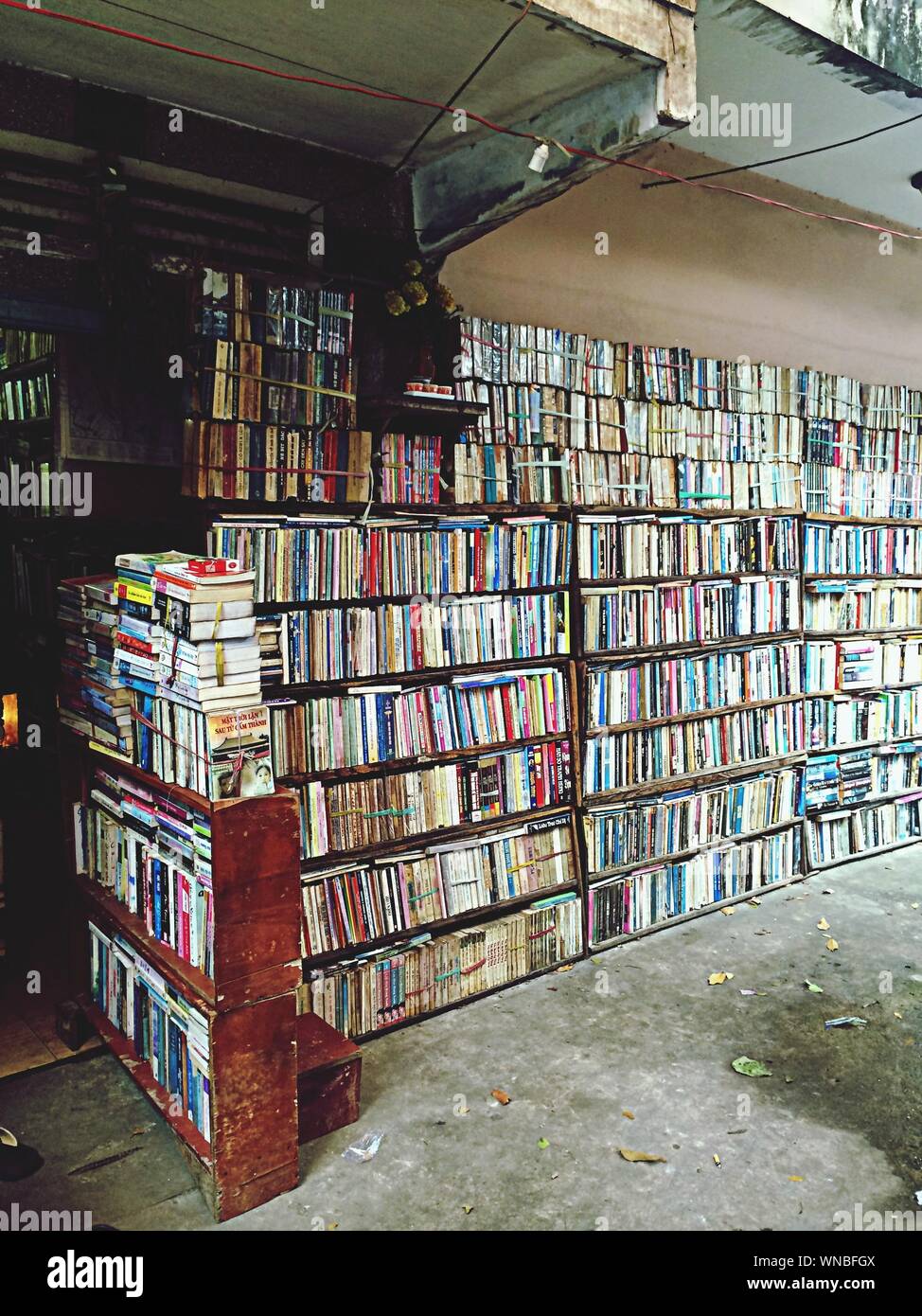 Books Arranged On Shelves In Library Stock Photo Alamy