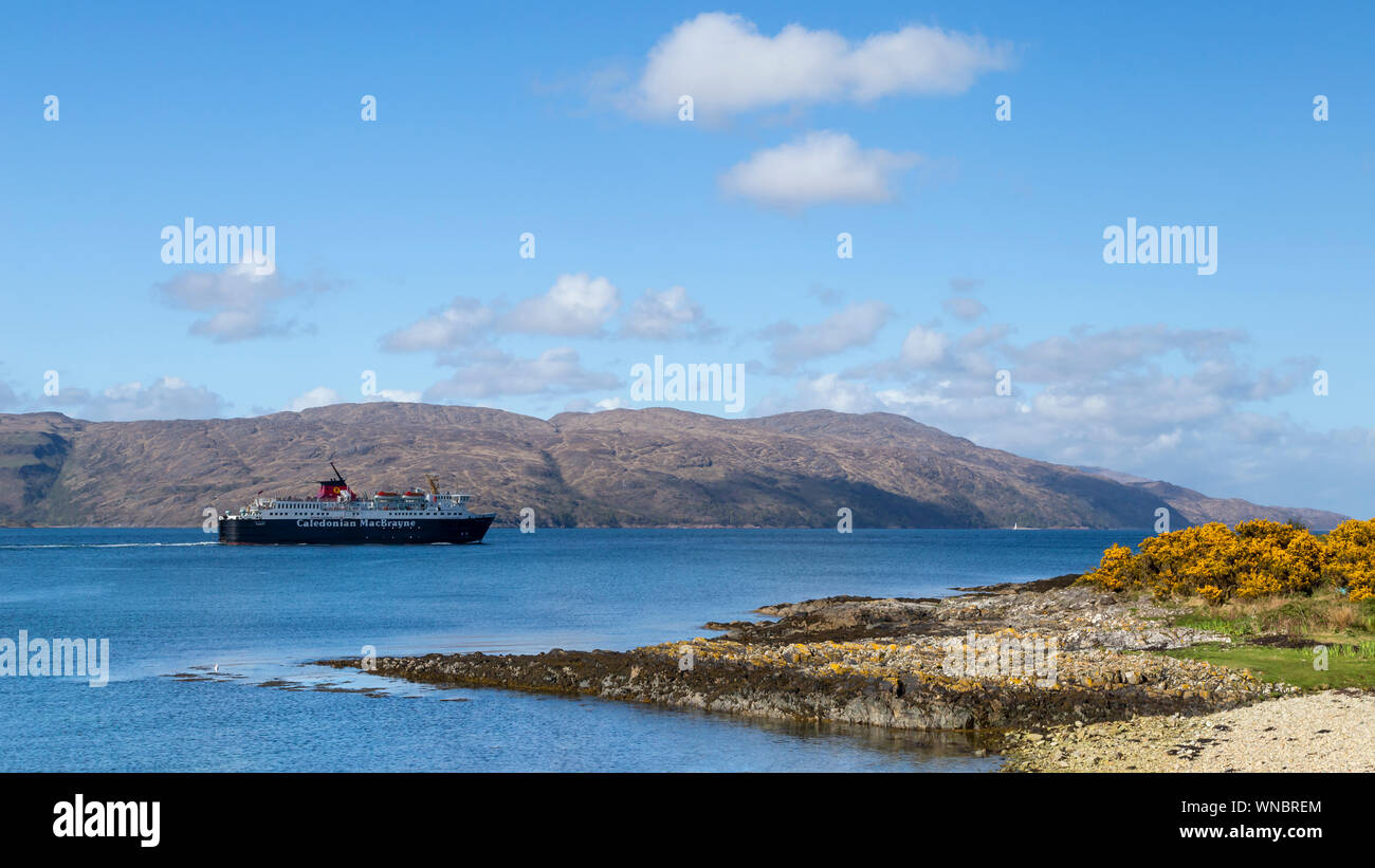 ferry leaving craignure port in mull Stock Photo