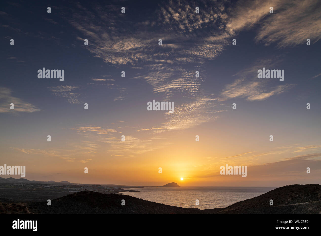 Sunrise over Montana Rojo from Montana Amarilla, Costa Silencio, early morning, Tenerife, Canary Islands, Spain Stock Photo