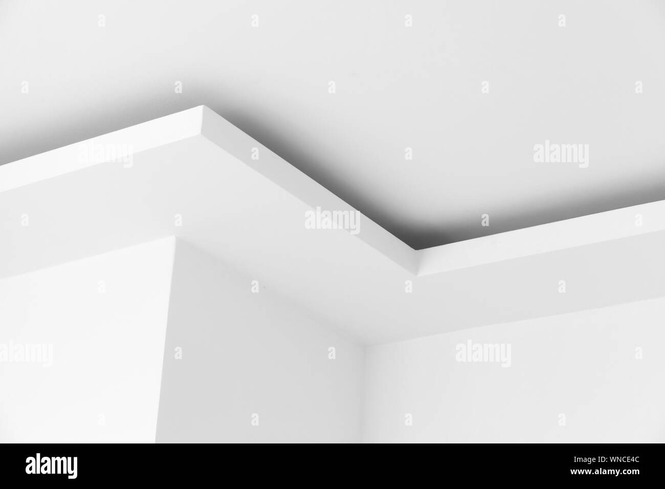 Abstract architectural background, white ceiling design with corners