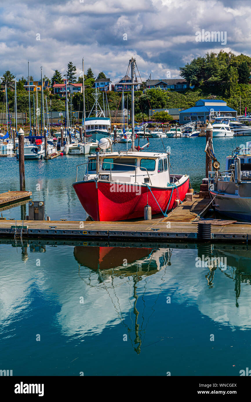 An old Red Fishing Boat in Marina in Bellingham, Washington Stock Photo