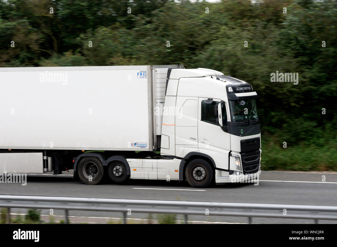A Volvo articulated lorry on the M40 motorway, Warwickshire, England, UK Stock Photo