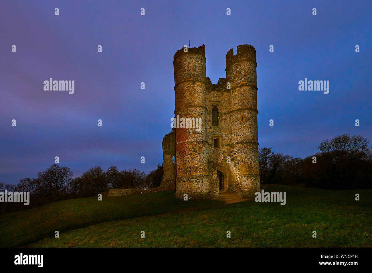 Donnington Castle on a winters evening during the blue hour painted with light, Newbury, Berkshire, UK Stock Photo