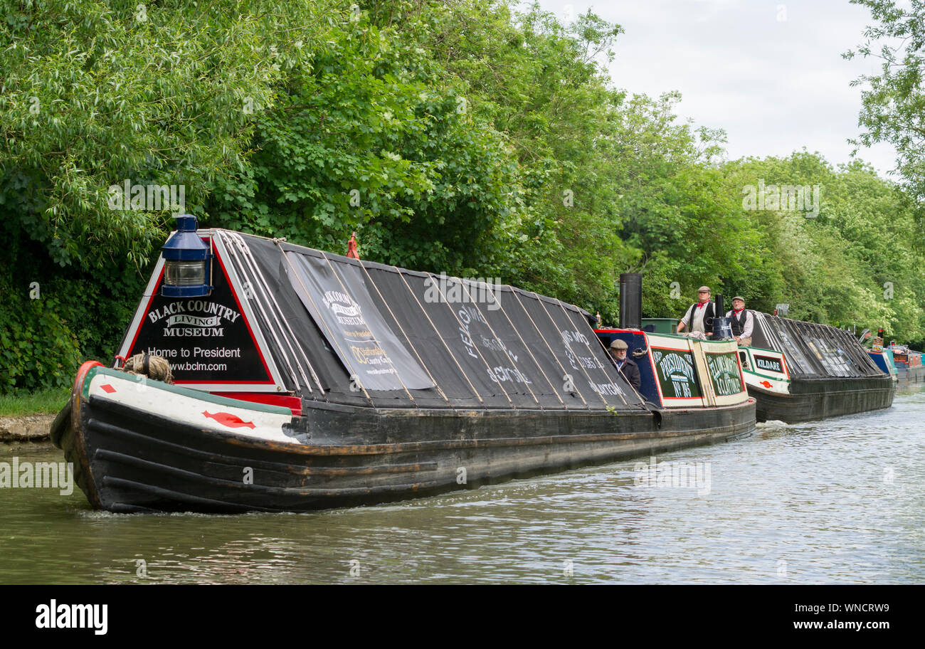 Steam powered narrowboat President and butty Kildare on Grand Union Canal, Milton Keynes Stock Photo