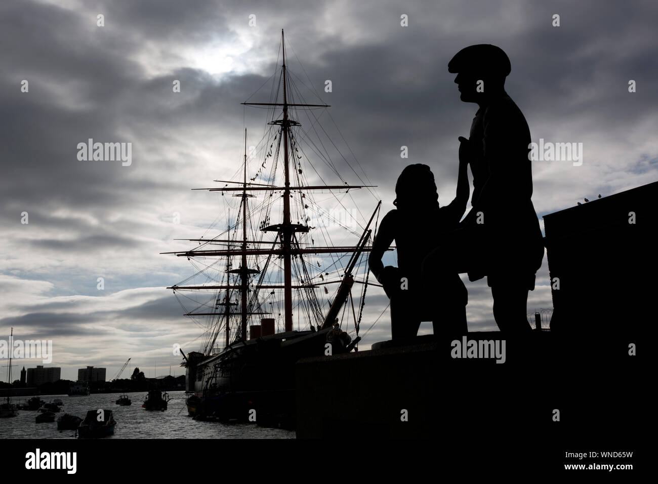 Mudlarks,Statue,children,retrieving,coins,Hard,Mudlarking,HMS Warrior,Naval,Docks,Portsmouth,Hampshire,England,UK, Stock Photo