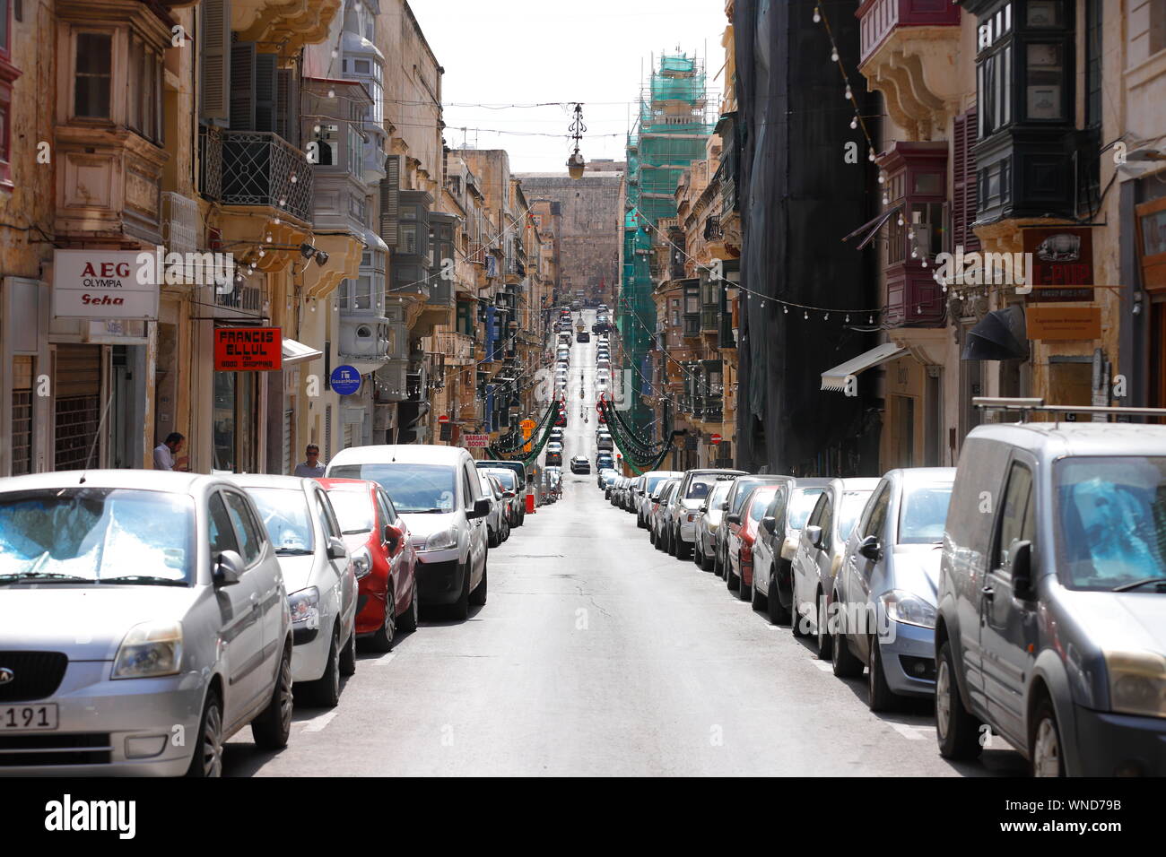 The view along Old Bakery Street in Valletta, Malta Stock Photo Alamy