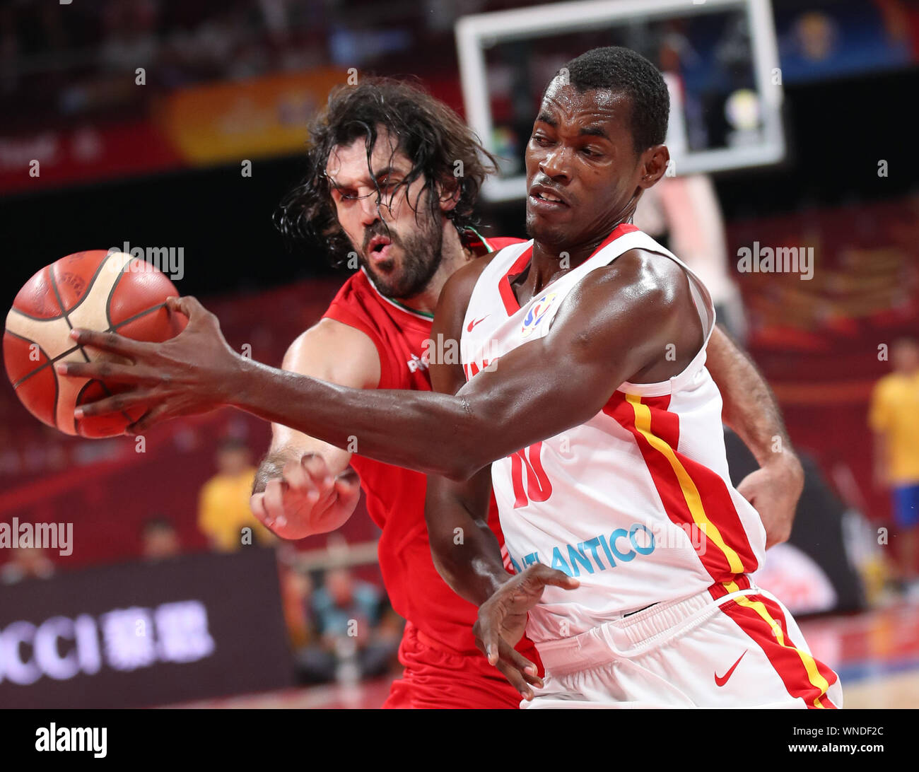 Beijing, China. 6th Sep, 2019. Jose Antonio (R) of Angola grabs the ball during the group N match between Iran and Angola at the 2019 FIBA World Cup in Beijing, capital of China, Sept. 6, 2019. Credit: Meng Yongmin/Xinhua/Alamy Live News Stock Photo