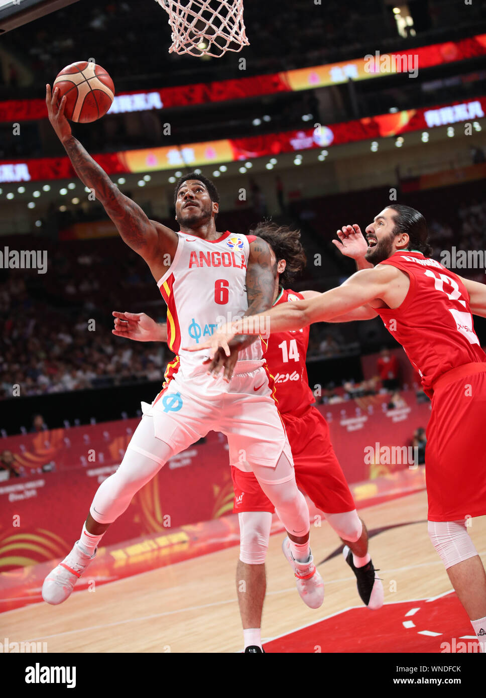 Beijing, China. 6th Sep, 2019. Carlos Morais (1st L) of Angola goes for a  basket during the group N match between Iran and Angola at the 2019 FIBA  World Cup in Beijing,
