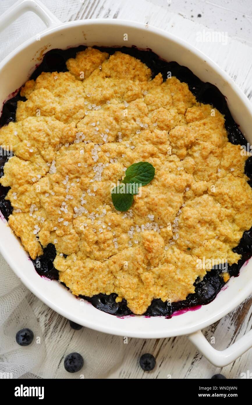 Homemade Blueberry cornmeal Cobbler baked in a Ramekin, selective focus
