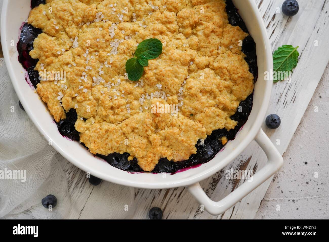Homemade Blueberry cornmeal Cobbler baked in a Ramekin, selective focus