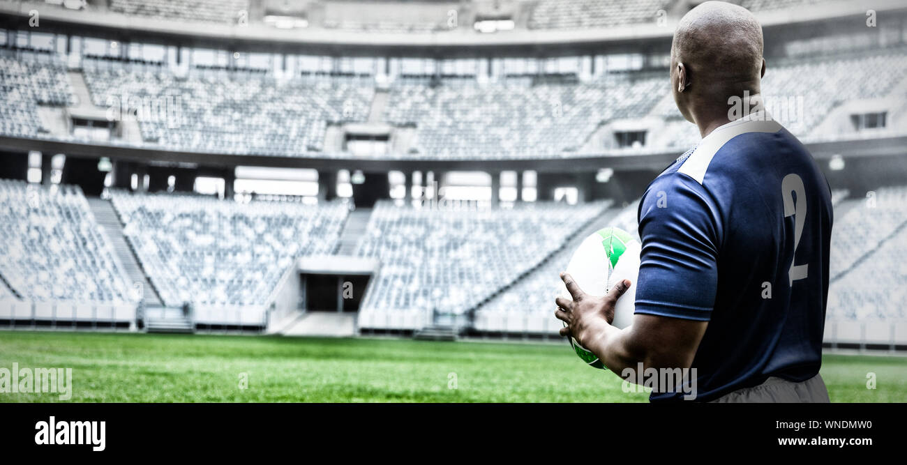 Composite image of strong rugby player Stock Photo - Alamy