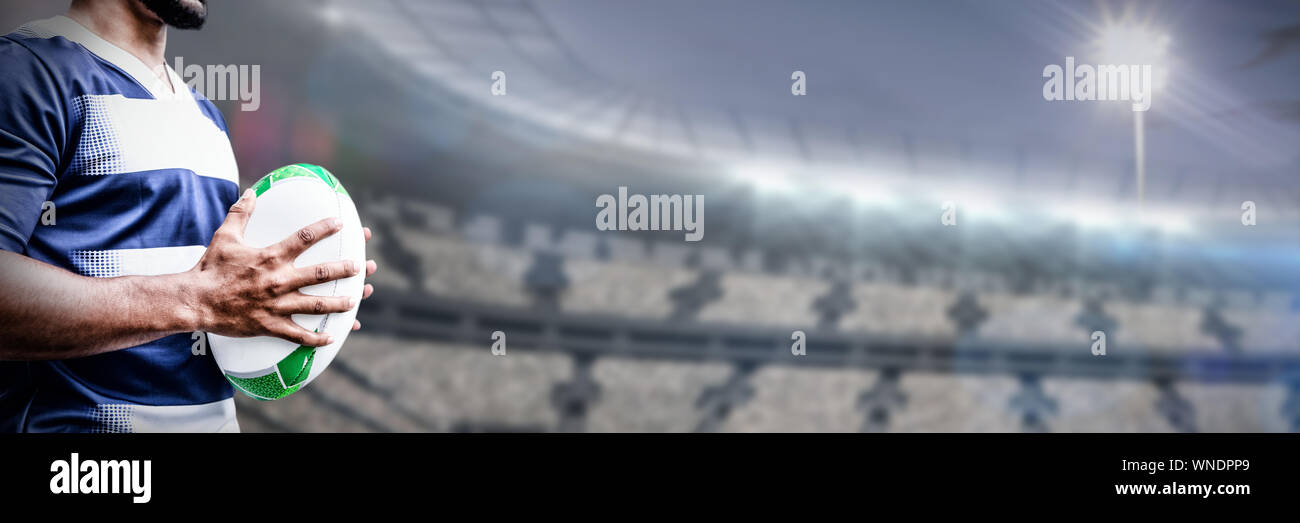 Composite image of strong rugby player Stock Photo - Alamy