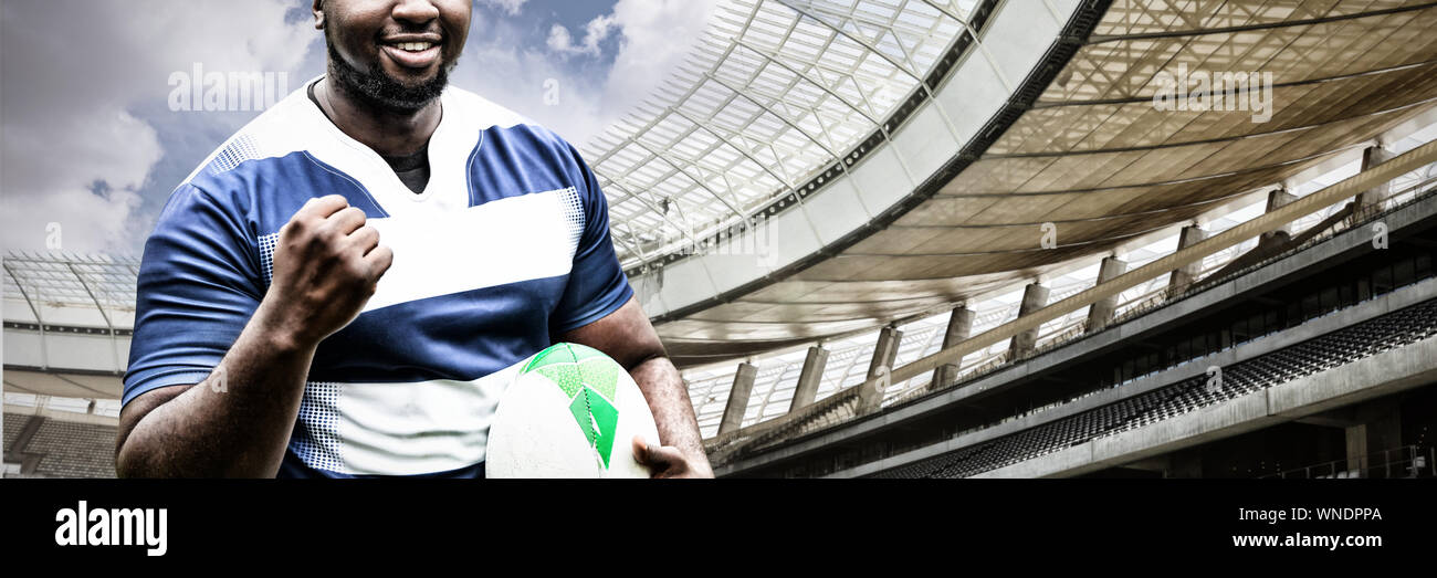 Composite image of strong rugby player Stock Photo - Alamy