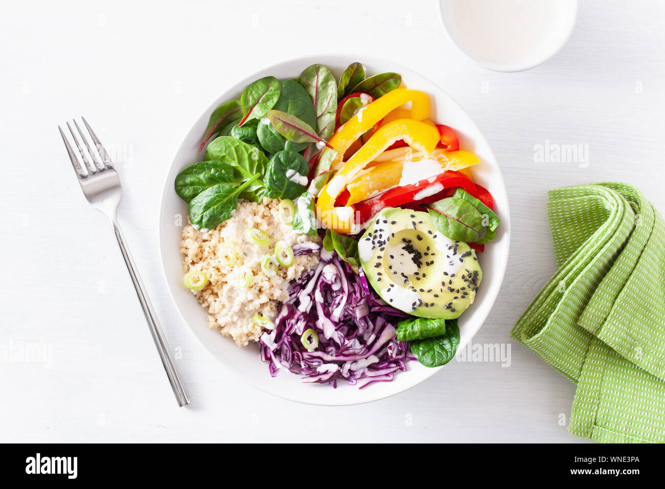 veggie couscous lunch bowl with avocado, bell peppers, spinach and red cabbage Stock Photo Alamy